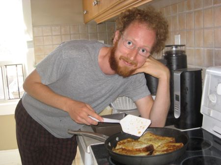 Aaron frying up some french toast.